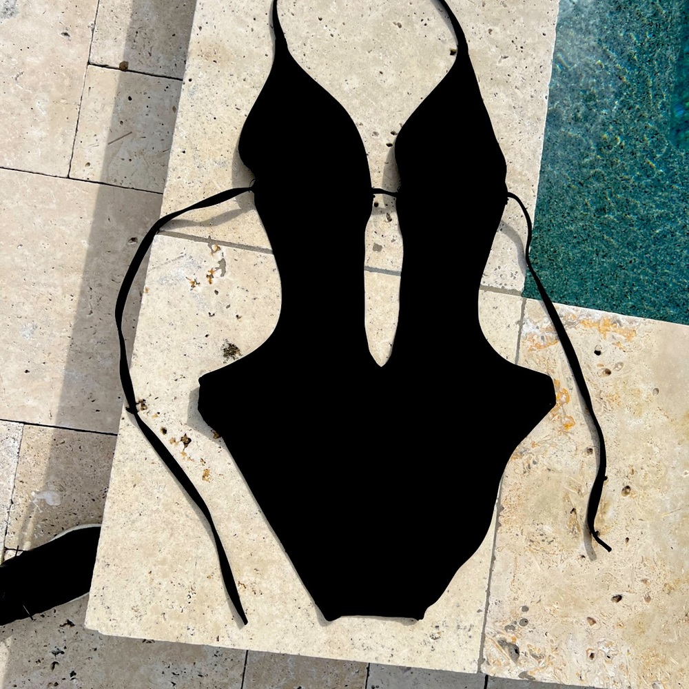 The hottest black bathing suit and swimwear you will ever put on! Size medium